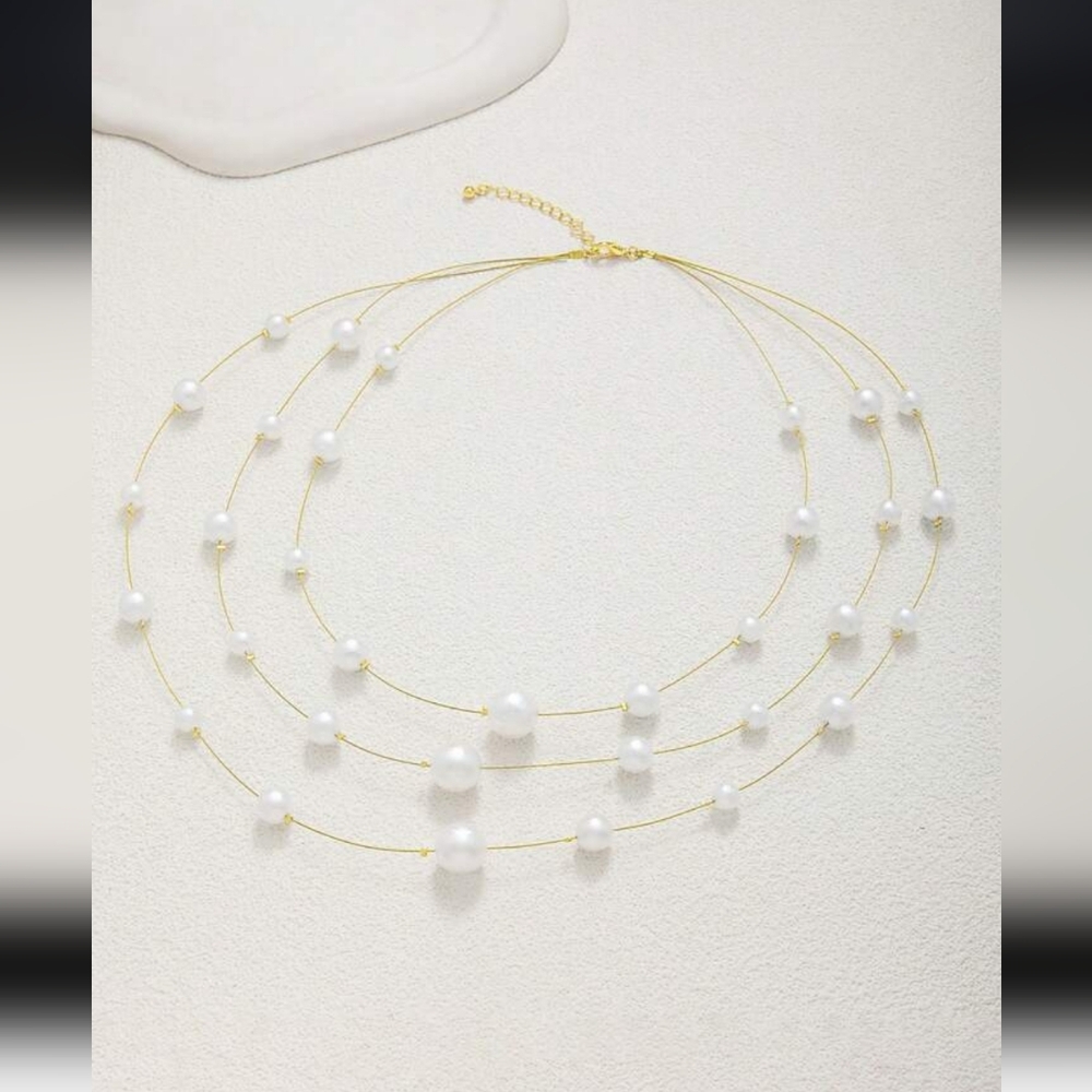 Elegant Gold and White Pearl Necklace